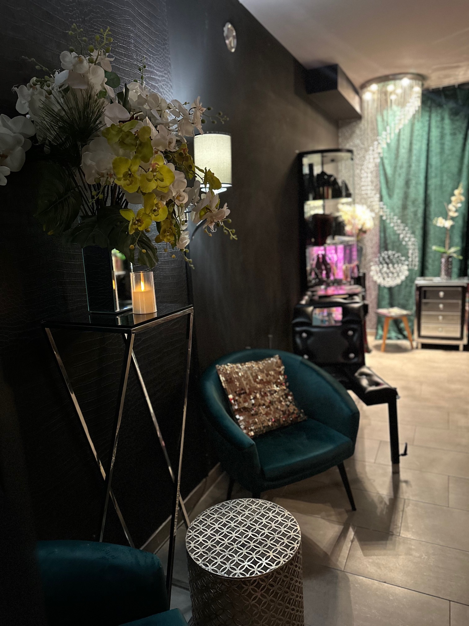 Luxurious red hallway with dramatic artwork and candles